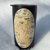 Utah's Arches & Canyonlands National Park sticker on a thermos sitting outside in the snow.