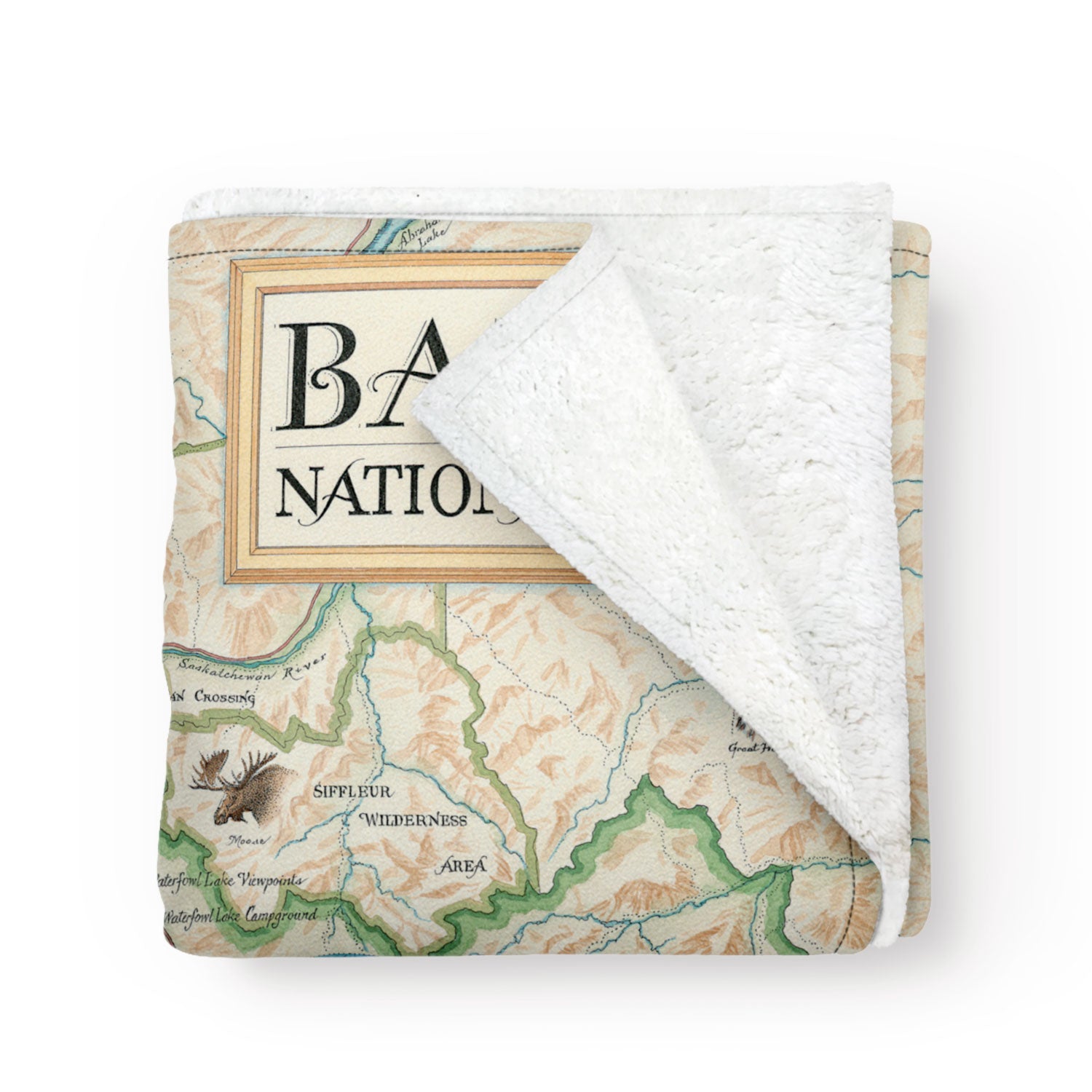 Banff National Park Map Fleece Blanket in earth-tone colors. This map highlights Lake Louise, Moraine Lake, Lake Minnewanka, Peyto Lake, Emerald Lake, Mount Rundle, Mount Assiniboine, Cascade Mountain, Castle Mountain, Mount Temple, and Fairmont Banff Springs Hotel. Wildlife includes elk, mountain lions, Bald Eagles, gray wolves, Bighorn Sheep, black & Grizzly bears, moose, Great Horned owls, beavers, and more.