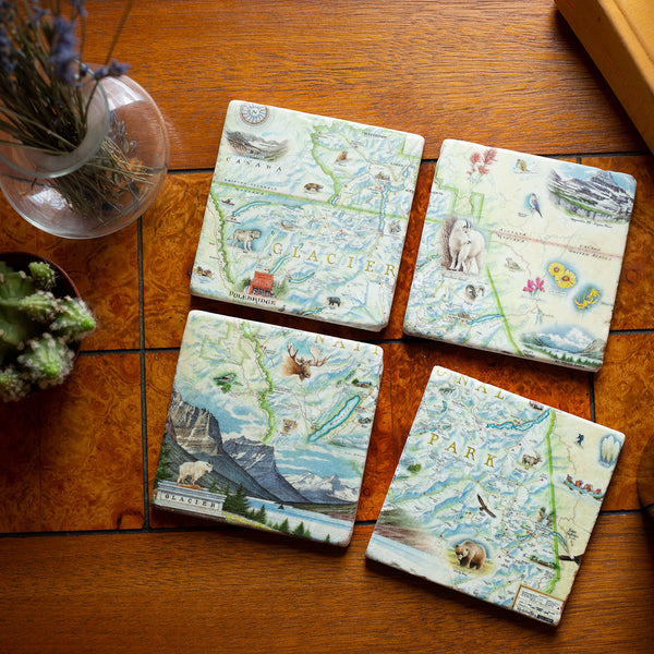 Glacier National Park Natural Stone Coaster Set by Xplorer Maps comes in a set of four making up the map of Montana. The coasters are sitting on a tile table with a cactus and candle. Features places in the park such as Logan Pass, Lake McDonald Lodge, Many Glacier Lodge, Two Medicine, Glacier Park Lodge, and the Going-to-the-sun Road. Flora and fauna include grizzly bears, elk, moose, mountain goats, and mountain lions.