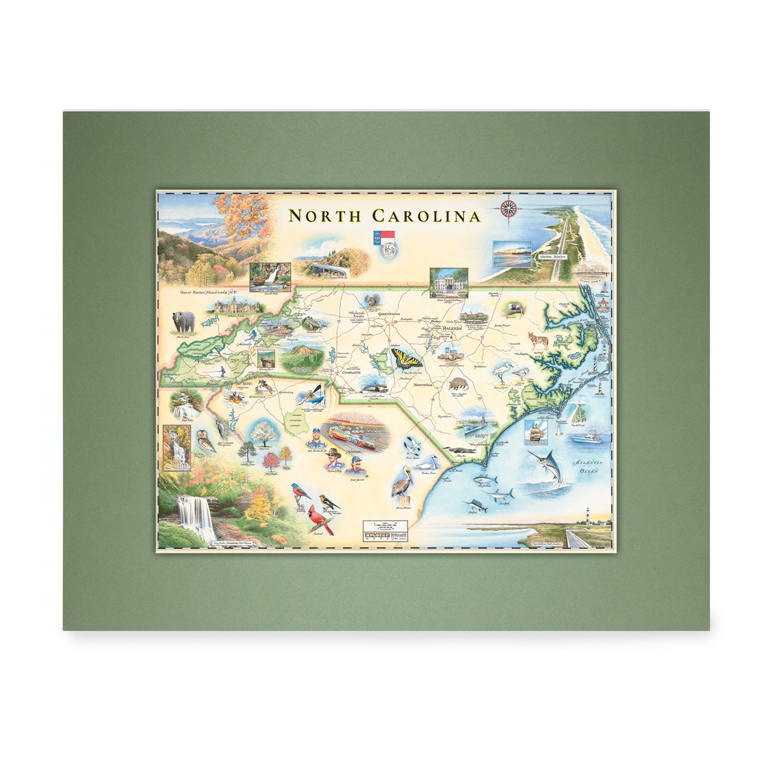 North Carolina State Mini-Map by Xplorer Maps. The map features Dry Falls in the Nantahala National Forest, the Outer Banks, a Nascar Hall of Fame, and the USS North Carolina on the coast.