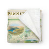 Folded fleece blanket with a map of Pennsylvania on it. Measures 58"x50." The picture of the throw is of the Poconos.