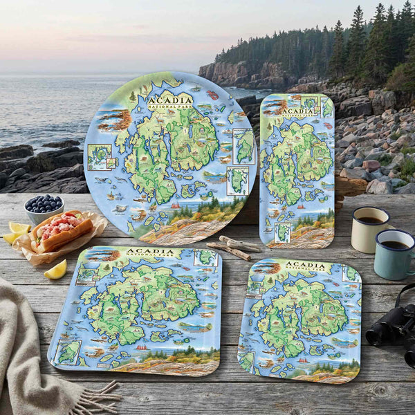 Set of Acadiana National Park-themed serving trays on a wooden table with scenic background.
