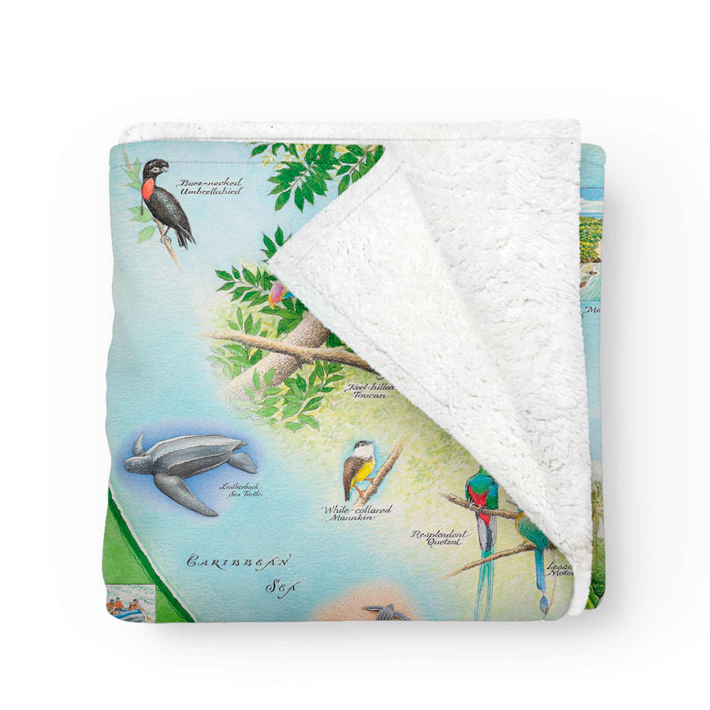 Folded Costa Rica Map Fleece Blanket showing soft corner fold