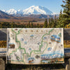 Map of Denali National Park and Preserve with a scenic mountain background
