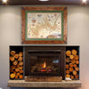 Framed Grand Canyon Map hanging on a wall above fireplace