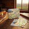 Kentucky-themed board game set on a wooden table with a scenic window view.