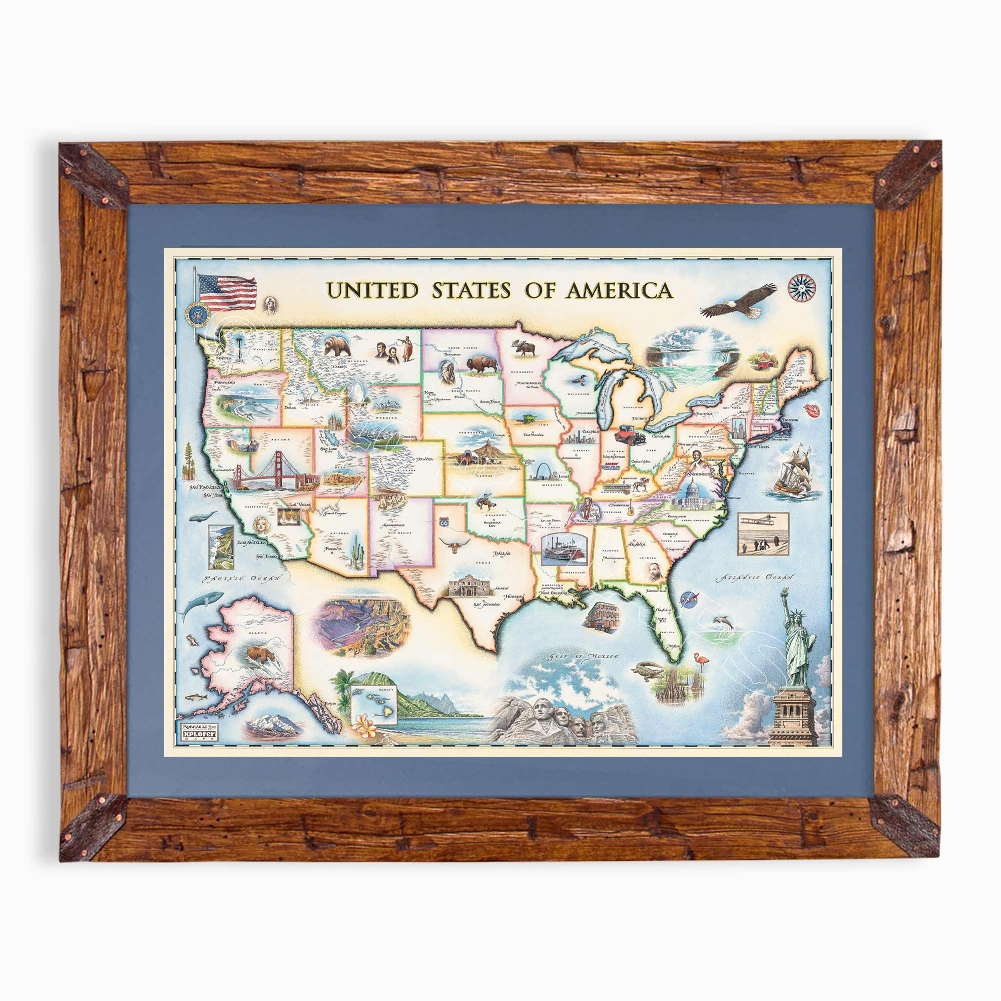 A framed vintage-style map of the United States of America, featuring a detailed illustrated map with state outlines, landmarks, and historical motifs, surrounded by a blue mat and a rustic brown wooden frame.