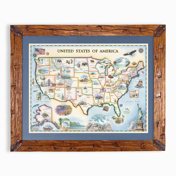 A framed vintage-style map of the United States of America, featuring a detailed illustrated map with state outlines, landmarks, and historical motifs, surrounded by a blue mat and a rustic brown wooden frame.