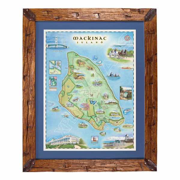 A framed illustrated map of Mackinac Island, featuring a rustic brown wooden frame and a blue mat border around the print.
