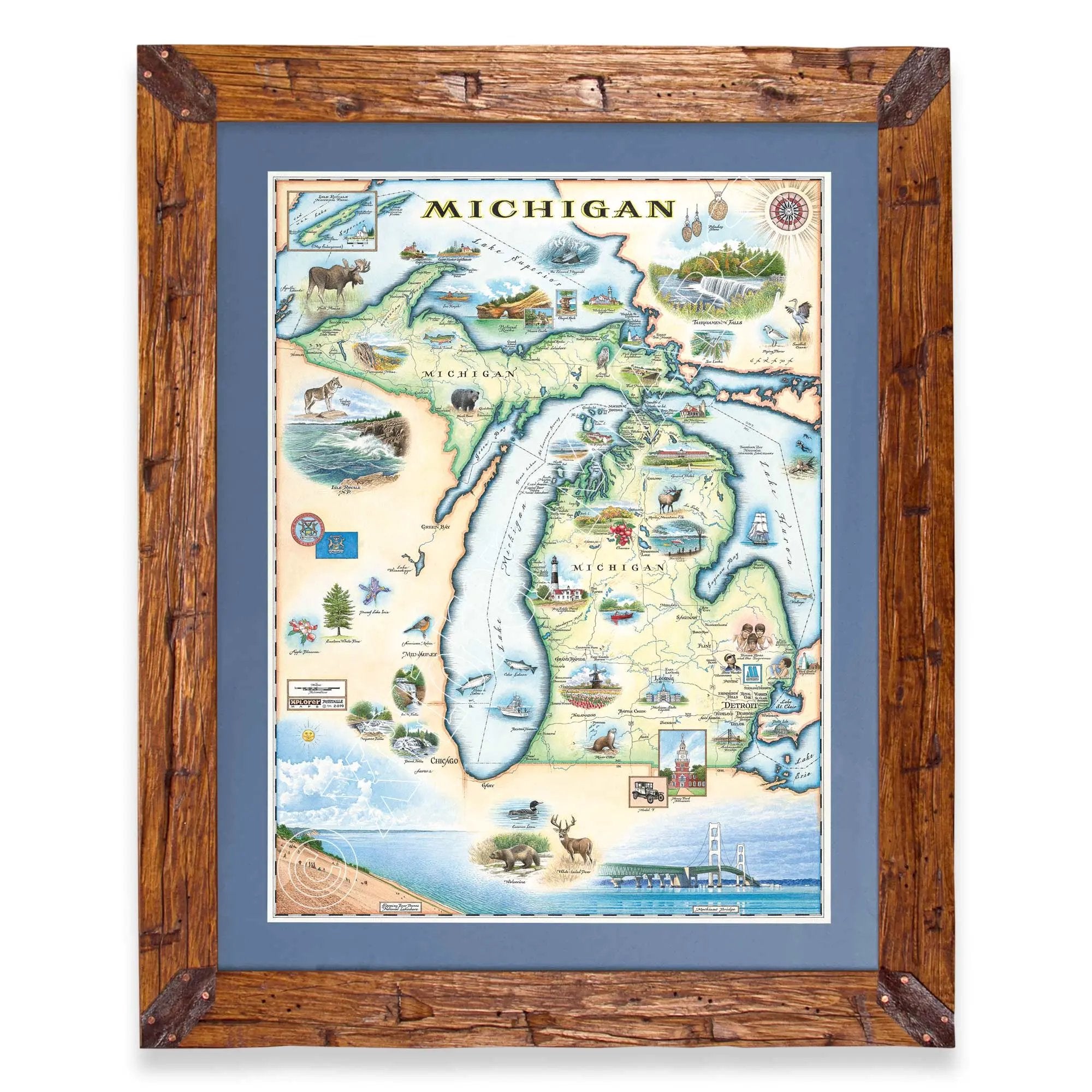 A framed vintage-style map of Michigan, featuring a rustic brown wooden frame, a blue mat, and a detailed illustrated map with lakes, wildlife, and landmarks.