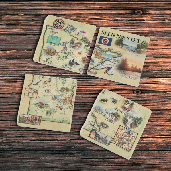 Minnesota Stone Coaster Set set of 4 on a wood table. The map showcases key landmarks including waterfalls, Lake Superior, Lake in the Woods, Split Rock Lighthouse, Paul Bunyan, Itasca State Park, and the capitol building. The design also features local w