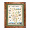 A framed vintage-style map of Red Rock Canyon National Conservation Area, featuring an illustrated map with scenic details, surrounded by a green mat and a rustic brown wooden frame.