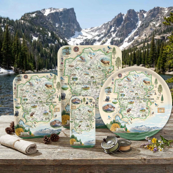 Set of serving trays with Rocky Mountain National Park design on a wooden surface with natural background