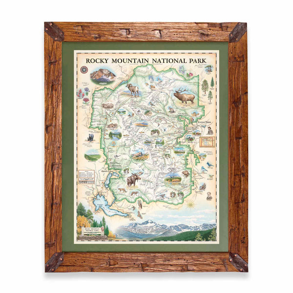 A framed vintage-style map of Rocky Mountain National Park, featuring a rustic brown wooden frame, olive green matting, and a detailed illustrated map with animals and landscape scenes.