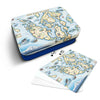 Monterey Bay playing cards in a metal case, with Jack, 10, and a card featuring the Monterey map on the backside.