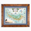 A framed vintage-style map print of Capetia, Nova Scotia, featuring a detailed illustrated island layout with palm trees, boats, landmarks, and a sunset along the coastline. The print is mounted with a blue mat inside a rustic brown wooden frame, shown against a plain white background.
