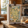 Jigsaw puzzle box featuring a map of Wisconsin on a wooden table with a cozy background.