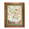 A framed illustrated map of Zion National Park, shown against a plain white background. The map features a cream-colored background with green outlined regions, detailed wildlife and geology illustrations, and a rustic brown wooden frame with dark metal corner brackets.